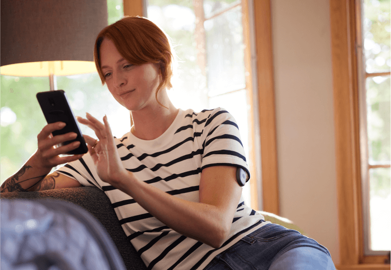 Eversense users uses smartphone and mobile app to pair transmitter and link sensor using a smartphone